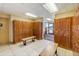 Locker room with wood lockers, benches, tile flooring, and an exit to the exterior at 610 S Clinton St # 3D, Denver, CO 80247
