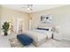 Well-lit main bedroom with ensuite bathroom, walk-in closet, and soothing color scheme at 610 S Clinton St # 3D, Denver, CO 80247