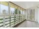 Enclosed porch featuring tile flooring and large windows for lots of natural light at 610 S Clinton St # 3D, Denver, CO 80247