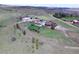 Expansive property featuring a large home, pool, outbuildings, and plenty of land at 1063 Clarke Ct, Castle Rock, CO 80109