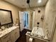 Bathroom featuring a soaking tub, separate shower, and granite vanity at 1063 Clarke Ct, Castle Rock, CO 80109