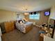 Comfortable bedroom with chandelier lighting and a calm, neutral color palette at 1063 Clarke Ct, Castle Rock, CO 80109