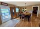 Inviting dining room with hardwood floors, a traditional dining set, and abundant natural light at 1063 Clarke Ct, Castle Rock, CO 80109