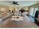 Open living room with plush seating, and light-colored walls at 1063 Clarke Ct, Castle Rock, CO 80109