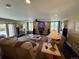 Cozy living room with a fireplace, mounted television, and comfortable seating, perfect for relaxation at 1063 Clarke Ct, Castle Rock, CO 80109
