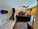 Large main bedroom with king bed and attached stairs to a bonus room at 1063 Clarke Ct, Castle Rock, CO 80109