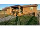 Covered patio with outdoor seating, a built-in grill, and a scenic view, perfect for enjoying the outdoors at 1063 Clarke Ct, Castle Rock, CO 80109