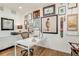 Well-lit office space with modern desk, stylish decor, and hardwood floors at 9678 E Powers Dr, Greenwood Village, CO 80111