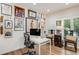 Charming home office space with natural light and hardwood floors at 9678 E Powers Dr, Greenwood Village, CO 80111
