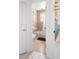 Hall bathroom featuring a shower-tub combo and classic fixtures at 1171 Quebec St, Denver, CO 80220