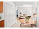 Dining area with round table and view into living room at 1171 Quebec St, Denver, CO 80220