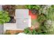 Aerial view of a well-maintained home, showcasing the roof, driveway, and landscaped backyard at 2108 S Idalia St, Aurora, CO 80013