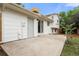 A backyard with a concrete patio, access to the home, and a view of the two-story construction at 2108 S Idalia St, Aurora, CO 80013