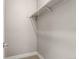 This closet offers ample storage space with a rod and shelf for organized hanging and folded clothes at 2108 S Idalia St, Aurora, CO 80013