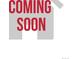 Coming Soon real estate sign announcing new property listing at 2108 S Idalia St, Aurora, CO 80013