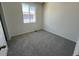 Cozy carpeted bedroom with natural light at 6638 N Nepal Ct, Aurora, CO 80019