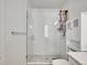 Modern bathroom with glass-enclosed shower and white subway tile at 1303 Jersey St, Denver, CO 80220