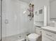 Contemporary bathroom featuring tiled shower and updated fixtures at 1303 Jersey St, Denver, CO 80220