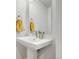 Bright bathroom featuring a modern sink, large mirror and stylish faucet at 1303 Jersey St, Denver, CO 80220