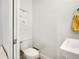 This stylish powder room features modern fixtures and charming decor at 1303 Jersey St, Denver, CO 80220