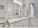 Bathroom featuring stylish vanity with ample counter space and storage at 1303 Jersey St, Denver, CO 80220
