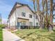 Stylish home exterior with modern architectural details, a well-kept lawn, and inviting curb appeal at 1303 Jersey St, Denver, CO 80220