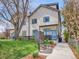 Well-maintained exterior featuring a modern design, landscaping, and a charming entrance at 1303 Jersey St, Denver, CO 80220