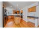 Spacious kitchen features an island and plenty of cabinet space at 18168 E Caley Cir, Aurora, CO 80016