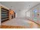 Expansive living room with a brick fireplace, neutral carpet, and ample space, for entertaining at 18168 E Caley Cir, Aurora, CO 80016