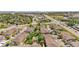 Aerial view showcasing the community's layout, landscaping, and nearby streets at 847 E 98Th Ave # 1806, Thornton, CO 80229