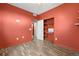 Bedroom boasts wood floors and an open closet for convenient storage at 847 E 98Th Ave # 1806, Thornton, CO 80229