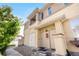 Inviting townhouse exterior features updated front entrance, stone accents and easy access with walkway and stairs at 847 E 98Th Ave # 1806, Thornton, CO 80229