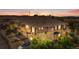 A beautifully landscaped townhome exterior at twilight featuring a private garage, and neutral color palette at 847 E 98Th Ave # 1806, Thornton, CO 80229