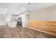 Spacious living space with vinyl plank flooring, and an open concept kitchen with stainless appliances at 847 E 98Th Ave # 1806, Thornton, CO 80229