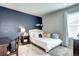 Cozy bedroom featuring a comfortable bed, stylish decor, and a relaxing atmosphere at 952 Morning Glory Rd, Brighton, CO 80640