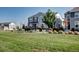 Beautifully landscaped home with a lush green lawn and well-maintained exterior at 952 Morning Glory Rd, Brighton, CO 80640