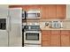 Bright kitchen with stainless steel appliances, plenty of counter space, and ample storage at 12764 Ironstone Way # 103, Parker, CO 80134