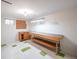 Finished basement workshop with workbench and pegboard at 1606 S Welch Cir, Lakewood, CO 80228