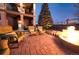 Backyard fire pit with outdoor seating offering a cozy space to unwind, perfect for outdoor enjoyment at 23426 E Ottawa Dr, Aurora, CO 80016