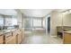 Primary bathroom with granite countertop, double sinks, and walk-in shower at 23426 E Ottawa Dr, Aurora, CO 80016