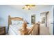 Inviting bedroom with ensuite bath and seamless flow into the hallway at 23426 E Ottawa Dr, Aurora, CO 80016