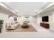 The finished basement features an open floor plan with living and entertaining areas at 3901 Stonegrass Pt, Broomfield, CO 80023