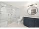 Modern bathroom with a glass-enclosed shower, dual shower heads, and updated vanity at 3901 Stonegrass Pt, Broomfield, CO 80023