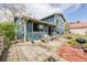 Outdoor patio area with a wooden picnic table, a concrete patio, and outdoor furniture at 4620 W 108Th Pl, Westminster, CO 80031
