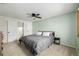 Serene bedroom with a ceiling fan, bedside tables, and a tranquil atmosphere at 4620 W 108Th Pl, Westminster, CO 80031