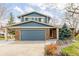 Charming two-story home featuring blue siding, brick accents, and a well-maintained front yard at 4620 W 108Th Pl, Westminster, CO 80031