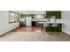Modern kitchen with updated cabinets, subway tile backsplash, and modern appliances, ideal for cooking at 4620 W 108Th Pl, Westminster, CO 80031