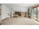 Upstairs living room with great natural light and sliding door to the backyard at 4620 W 108Th Pl, Westminster, CO 80031