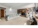 Cozy living room with brick fireplace, built-in shelving, neutral decor, and comfortable seating at 4620 W 108Th Pl, Westminster, CO 80031