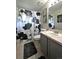 This full bathroom features a shower-tub combo and a stylish black and white shower curtain at 23846 Genesee Village Rd, Golden, CO 80401